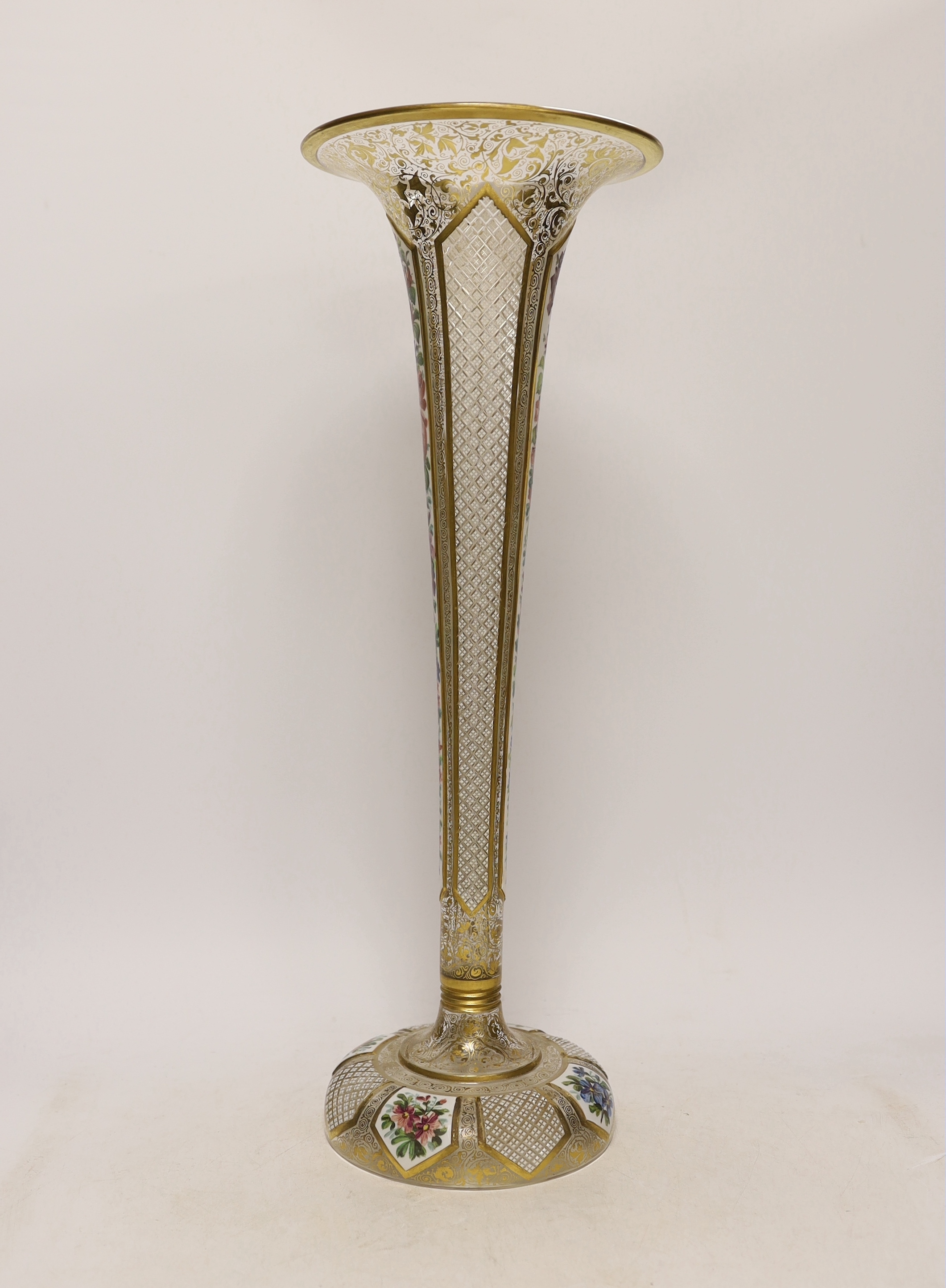 A large late 19th century Bohemian gilt and enamelled glass trumpet shaped vase, 50cm